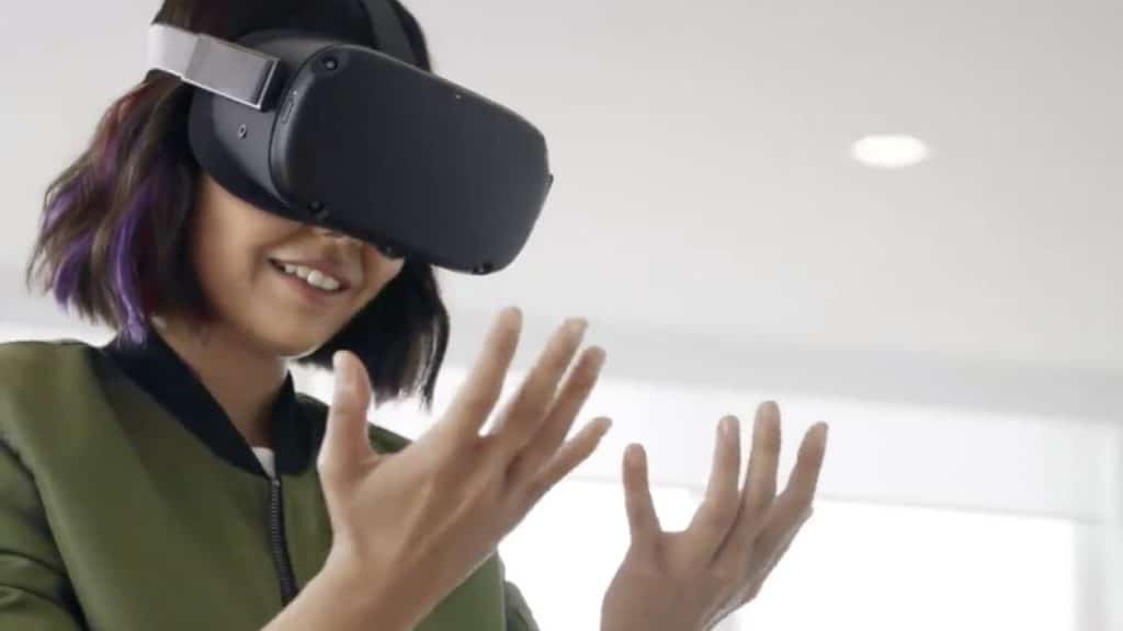 woman using the oculus quest vr headset with hand tracking
