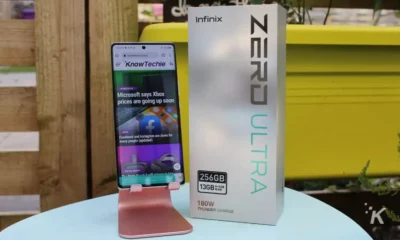 Infinix Zerd Ultra phone on stand next to it's box